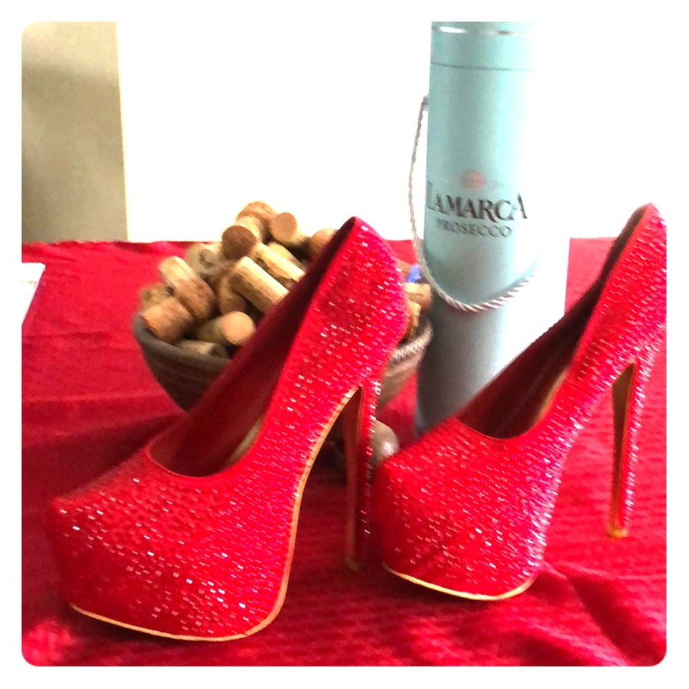 Gorgeous bedazzled platform red stiletto’s